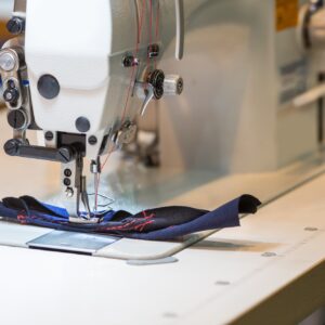 Sewing or overlock machine closeup, nobody